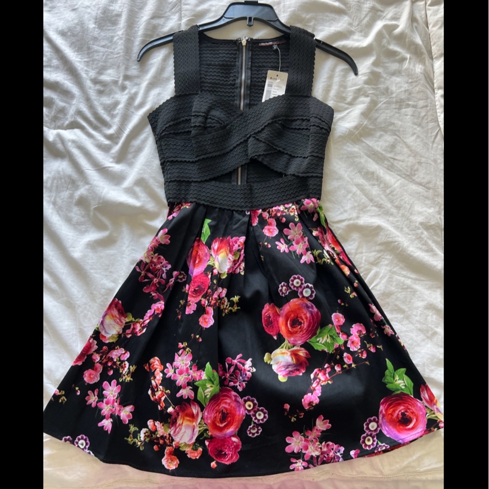 Floral mini dress with black bandage bodice